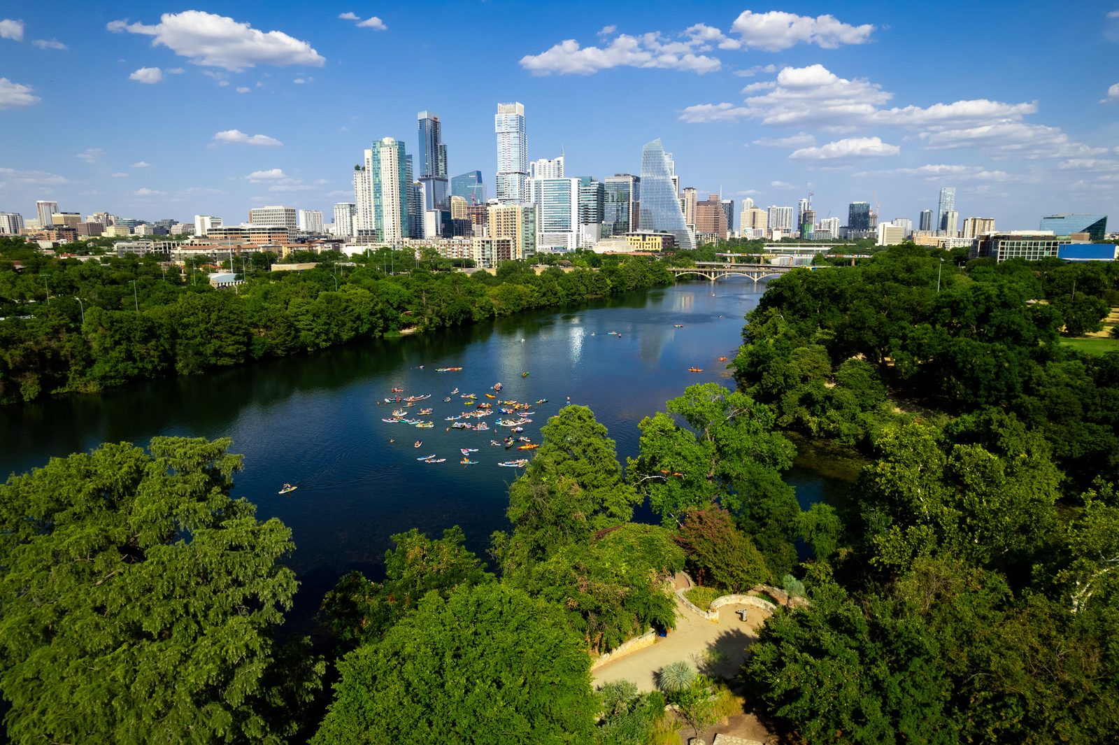 Downtown Austin skyline along the river, representative of the Texas communities Deep Roots serves